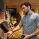 The fact that the man uses the ticket kiosk to avoid talking to theater employees is sad on a social and psychological level, reports indicate.